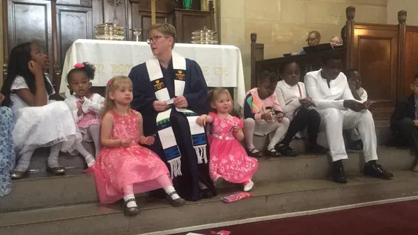 Children gathered with Pastor Shawn for the Children's Moment during worship