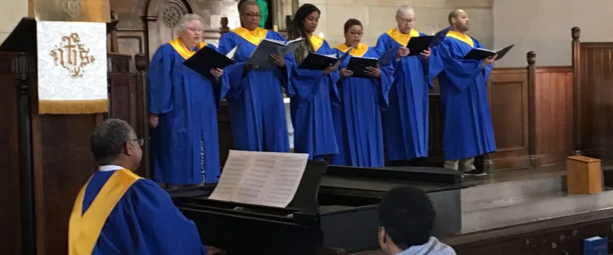 The Sixth Presbyterian Choir singing together in the sanctuary