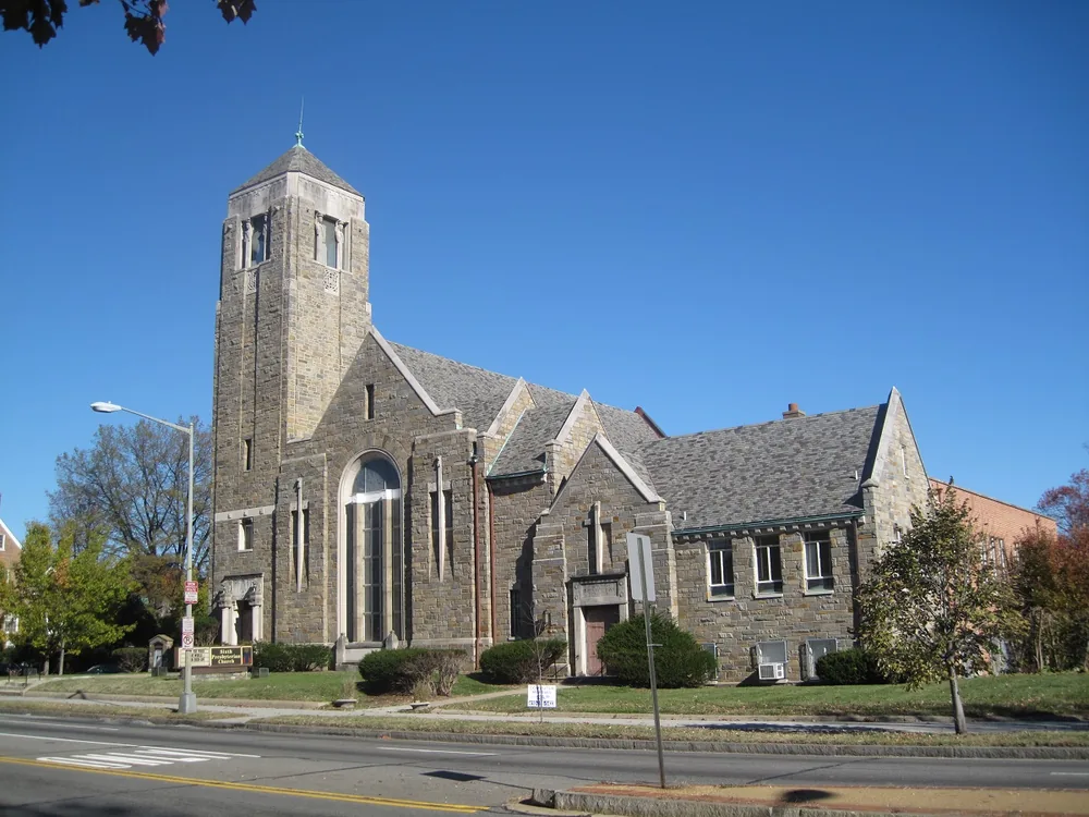 The stone exterior and bell tower of Sixth Presbyterian Church, seen from 16th Street NW in Washington, DC